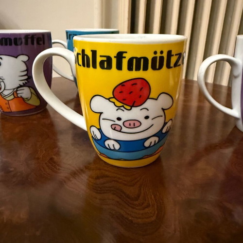 Set of 4 colorful ceramic mugs with humor like new