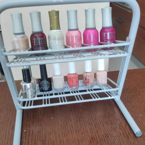 Orly metal tabletop stand with 36 slots for nail polishes used
