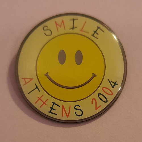 Pin Olympic Games Athens 2004 USA "Smile - Χαμόγελο" new