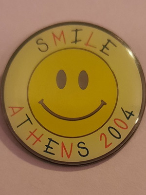 Pin Olympic Games Athens 2004 USA "Smile - Χαμόγελο" new