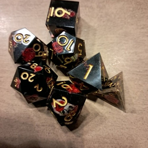 Black D&D dice set with red rose design