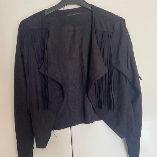 Women's short jacket used with fringes and castor texture