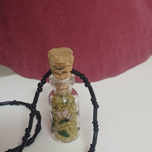 Handmade pendant glass bottle with gold glitter and beaded chain