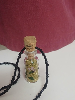 Handmade pendant glass bottle with gold glitter and beaded chain