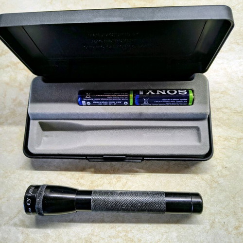 Mini Maglite flashlight used, metal with two batteries