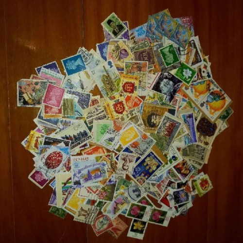 Foreign stamps used, 255 pieces with album and 2 envelopes
