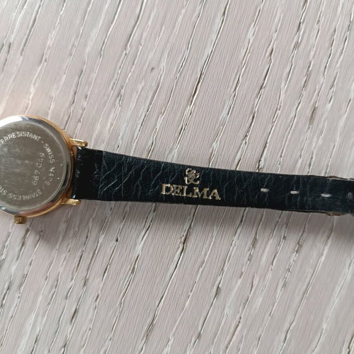 Delma watch moon phase women's used, needs strap