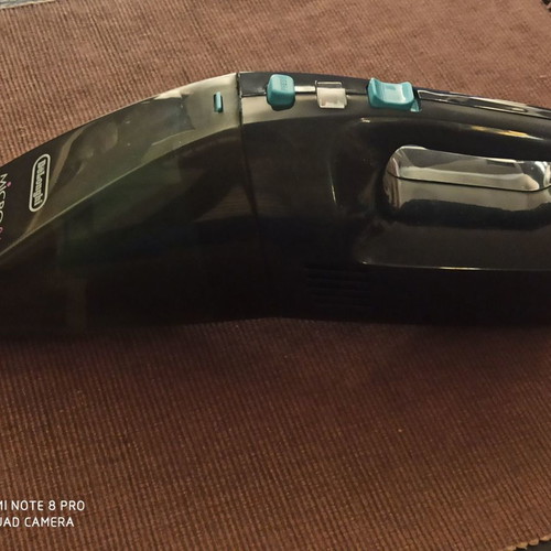 Delonghi handheld vacuum used, blue black, 6V with battery and charger