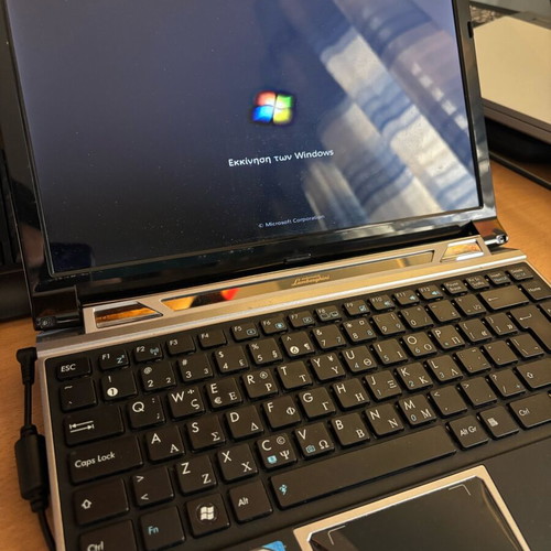 ASUS Automobili Lamborghini VX6 netbook used with charger