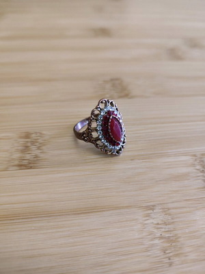 Vintage ring with red stone used