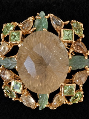 Silver and gold-plated ring with opal, peridot and tanzanites, like new