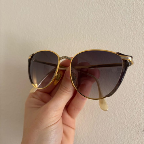 Vogart vintage sunglasses used with gold frame and silver details