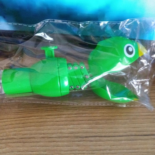 Parrot bubble blower toy with moving head and mouth
