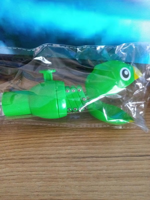 Parrot bubble blower toy with moving head and mouth