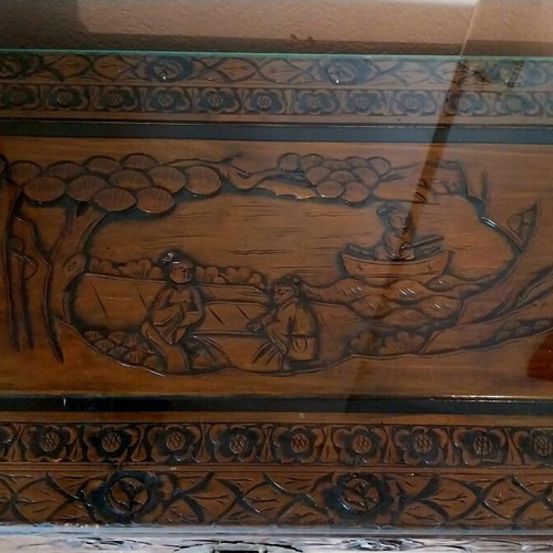 Carved chest used with thick glass