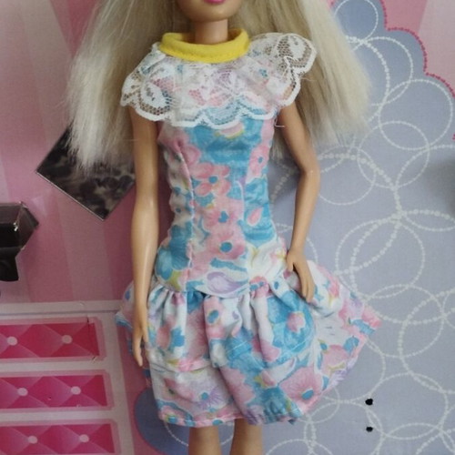 Vintage Barbie doll with vintage dress