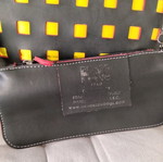 FRNC shoulder bag like new, black with yellow and red details