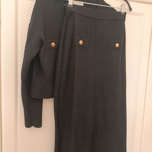 Classic fine knit skirt and blouse set with gold buttons