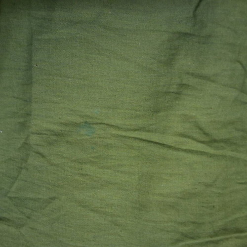 Green dress used with embroidered flowers and elastic sleeves
