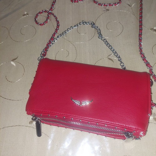 Red women's shoulder and handbag