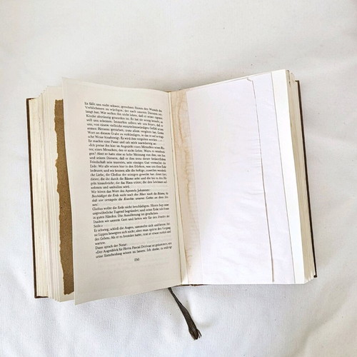 Refurbished book To Kane-Oti-Theleis with stones and 92 pages