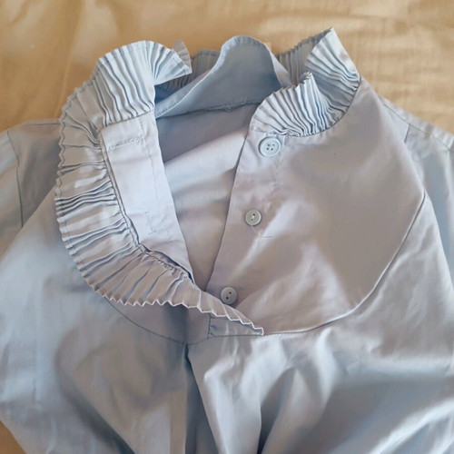 Blue shirt like new, size S with smocked waist and cuffs
