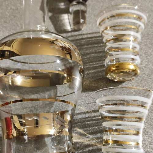 Vintage glass decanter set with 2 glasses used, gold decorations
