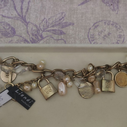 Handmade charm bracelet Liandi exclusive, gold tone