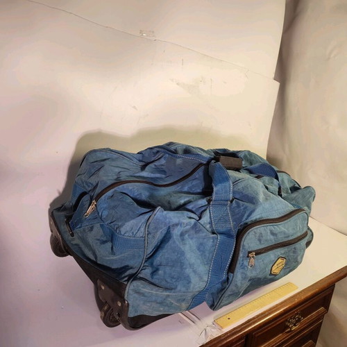 Large Enrico Benetti suitcase used with wheels and hard base blue