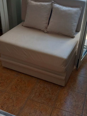 Sofa bed with storage space, new
