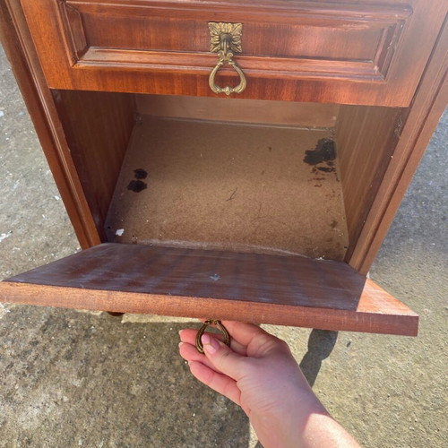 Wooden bedside cabinet used with drawer and cupboard
