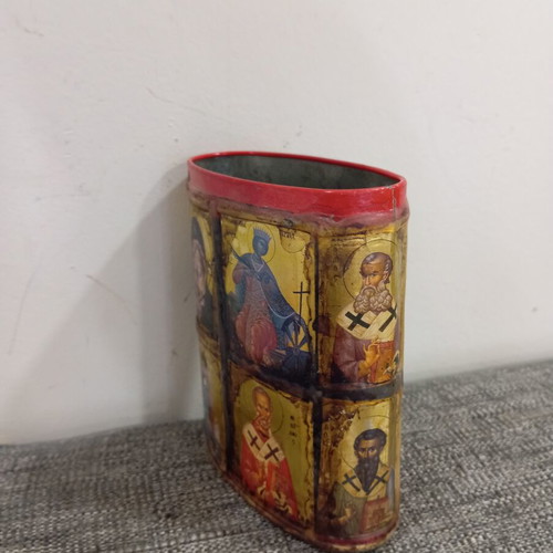 Vintage metal pencil holder decorated with icons used