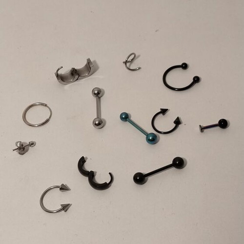 Piercing earrings set used with various designs and sizes