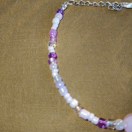 Handmade pink bracelet with silver elements