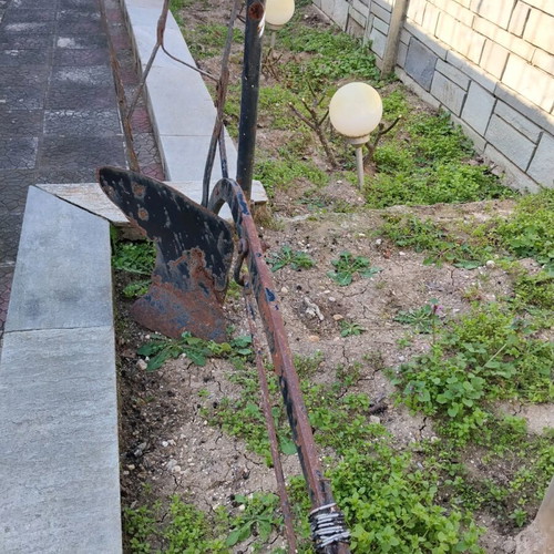 Yni used, old-style soil cultivator for garden decoration