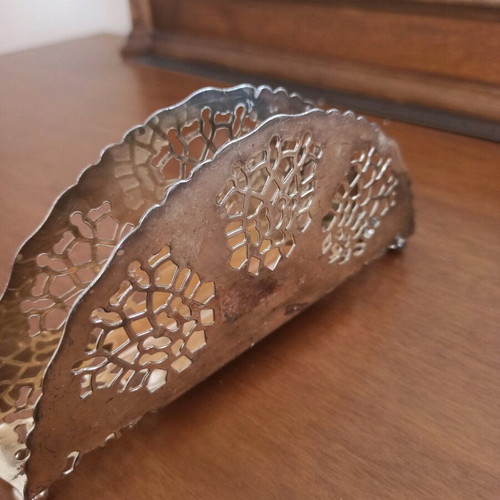 Napkin holder like new, silver with intricate cutout design