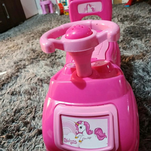 Pink children's toy car used
