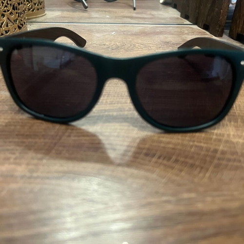 Jägermeister collectible sunglasses with bamboo arms, dark green frame