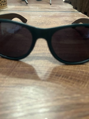 Jägermeister collectible sunglasses with bamboo arms, dark green frame