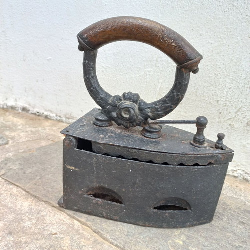 Karavaki Charcoal Iron used with ornate handle design