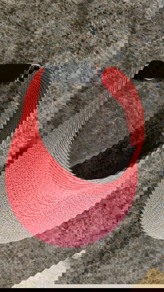 Red sun visor with elastic band