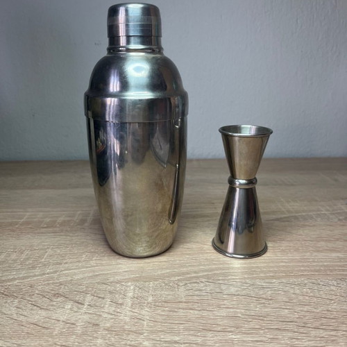 Cocktail shaker and jigger used, stainless steel