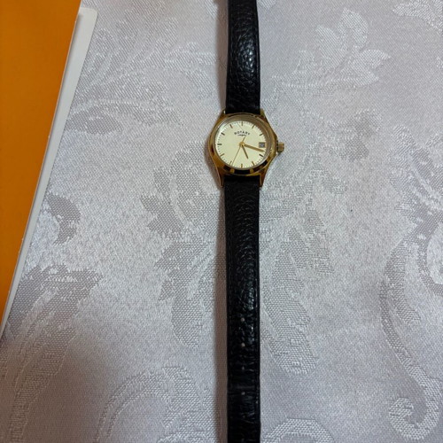 Rotary women's watch gold, like new, classic dial with date