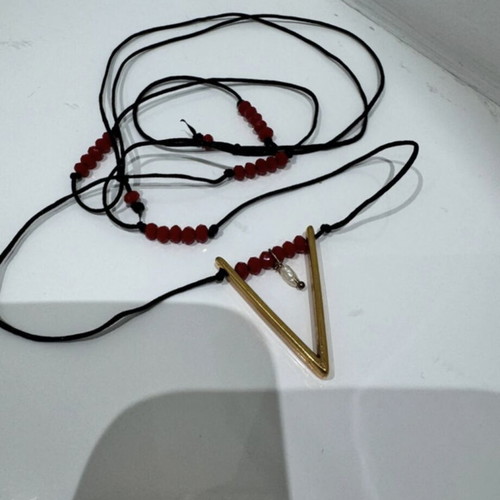 Handmade boho-vintage necklace with gold detail and pearl