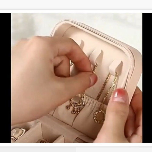 Portable jewelry organizer new, pink, with zipper and compartments