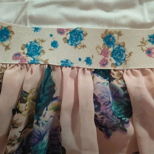 Wonderful short floral skirt with straps