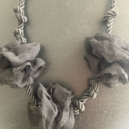 Pendant used with black fabric flowers
