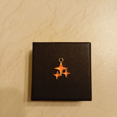 Pendant with star design, gold plated, new