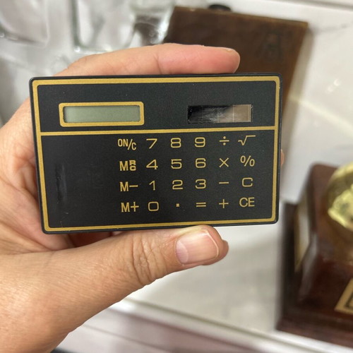 Ultra Thin Calculator with Touchscreen and Solar Power, Like New