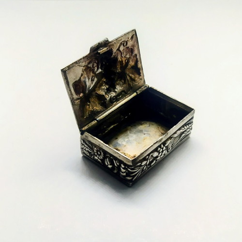 Old silver-plated pill box with embossed decoration like new